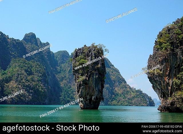 01 March 2020, Thailand, Khao Phing Kan: The prominent rock Khao Ta-Pu from the island Khao Phing Kan photographed. The island belongs to the Ao Phang-nga...