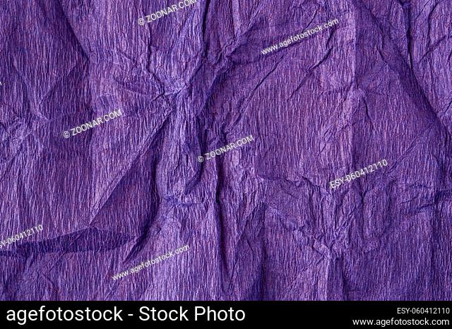 Crumpled old magenta paper texture. Abstract grunge background. Distressed and industrial backdrop design. Dirty detail grain pattern