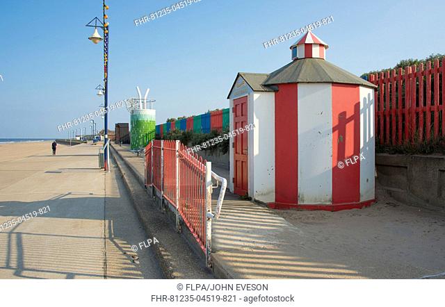 Beach huts at seaside town, part of series of commissioned beach huts in council 'Bathing Beauties' scheme, Mablethorpe, Lincolnshire, England, June