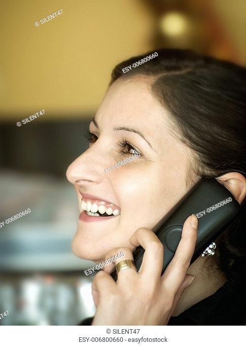 Beutiful woman having a conversation on the phone