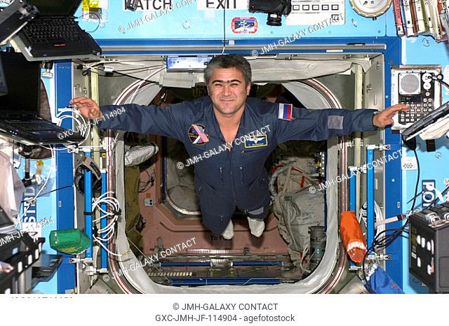 Cosmonaut Salizhan S. Sharipov, Expedition 10 flight engineer representing Russia's Federal Space Agency, floats in the Destiny laboratory on the International...