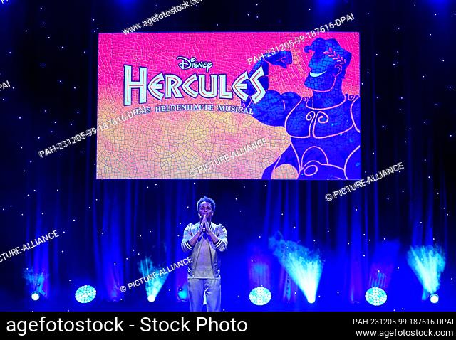 05 December 2023, Hamburg: Musical actor Benet Monteiro as Hercules sings during the press presentation of Disney's musical ""Hercules"" on stage at the...