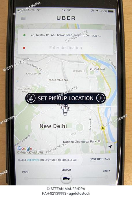The Uber app on a cell phone in the Indian capital New Delhi, India, 30 June 2016. The taxi aggregators Uber and Ola are currently introducing expensive...