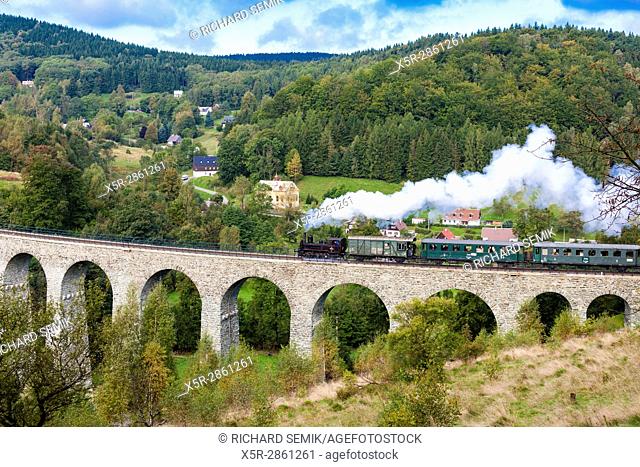 steam train on viaduct Novina, Krystofovo Valley, Czech Republic