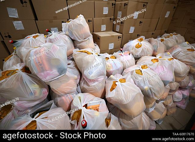 RUSSIA, NOVAYA KAKHOVKA - AUGUST 1, 2023: Bags with food kits are seen at a humanitarian center. Employees of the center compile food kits and distribute...