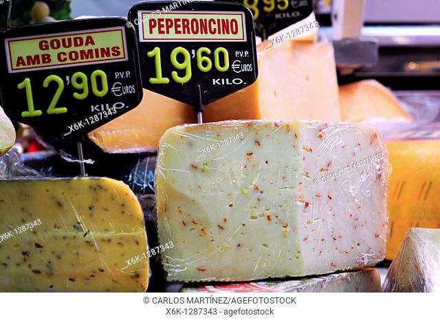 Assorted cheeses. La Boqueria market, Barcelona, Catalonia, Spain