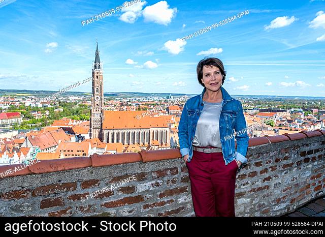 08 May 2021, Bavaria, Landshut: Janina Hartwig, actress, stands above the old town during a break in filming. In the Bavarian town of Landshut