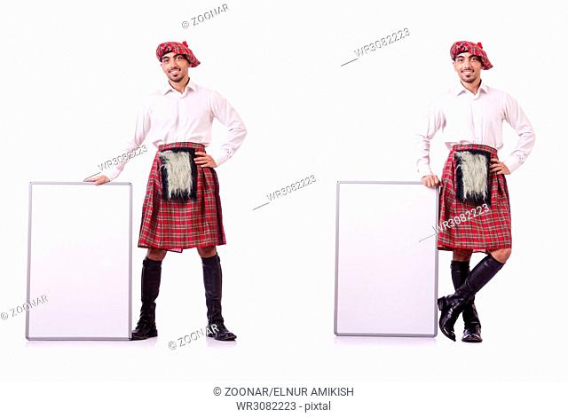 Scotsman with blank board on white