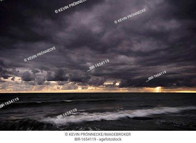 Stormy atmosphere at dusk on the Baltic coast of Ruegen Island, Mecklenburg-Western Pomerania, Germany, Europe