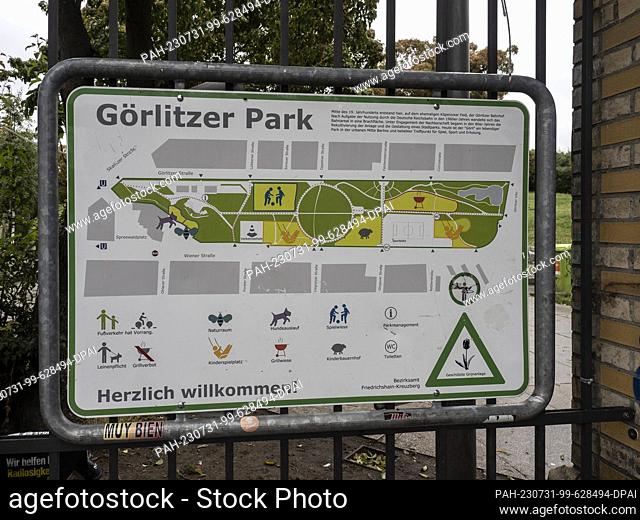 31 July 2023, Berlin: An information board stands at Görlitzer Park. The green space in Kreuzberg is a source of discussion time and again