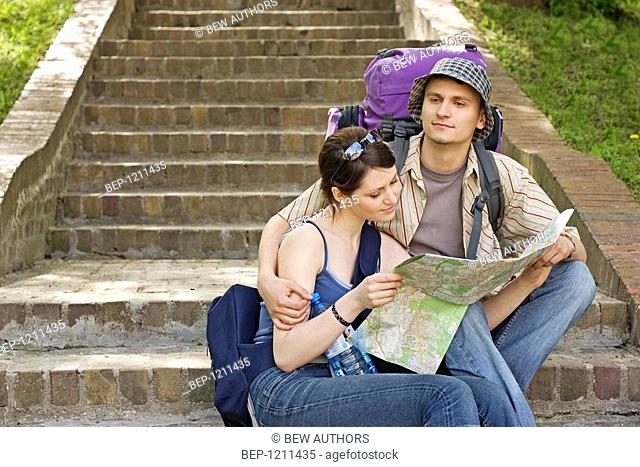 Tourists with map
