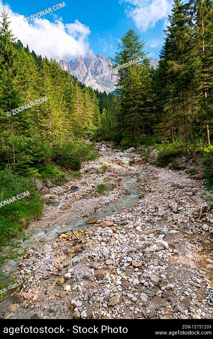 View of Furchetta mountain with a river on the foreground on the Dolomites Italian Alps mountains