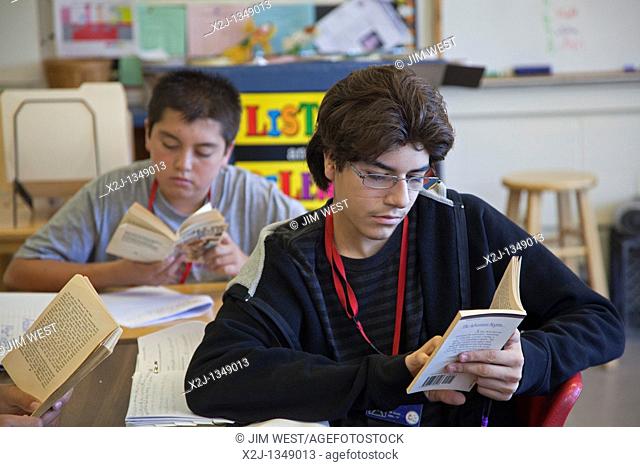 Española, New Mexico - Eighth grade students read 'The Call of the Wild' in language arts class at McCurdy School, a private school supported by the United...