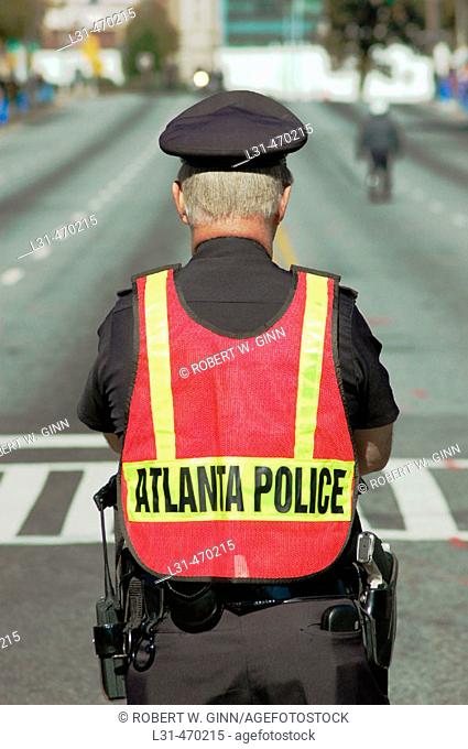 Police officer directing traffic. Atlanta, Georgia. USA