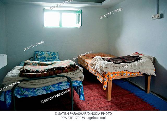 Bed in Rooms at narayan ashram pithoragar uttarakhand India Asia