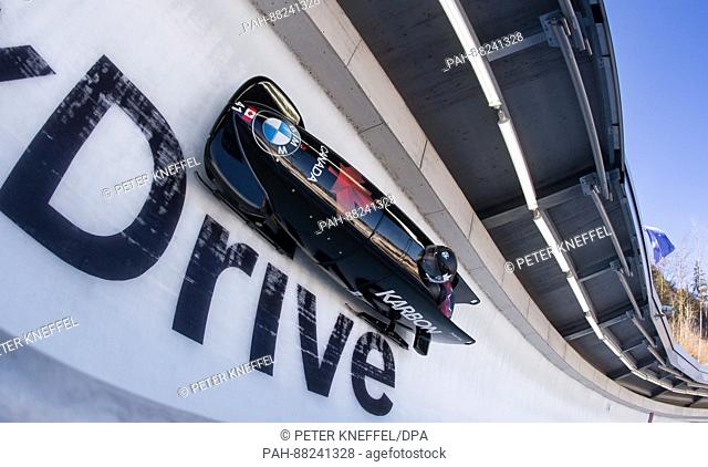Bobsleigh athletes Nick Poloniato and Neville Wright from Canada in the 3rd lap going through the echo curve in Schoenau am Koenigssee in Germany