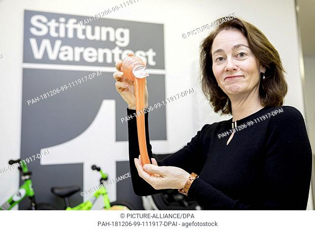 06 December 2018, Berlin: Katarina Barley (SPD), Federal Minister of Justice, is holding the iBase Toy brand slime after a press conference by Stiftung...