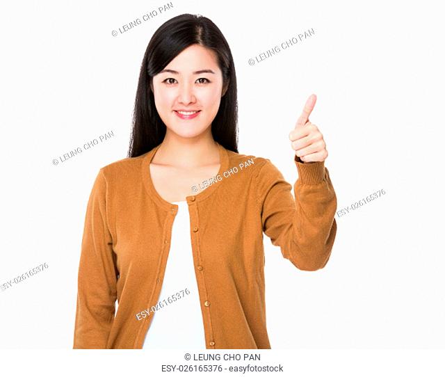 Young Woman showing thumb up gesture
