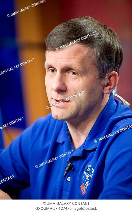 Russian cosmonaut Andrey Borisenko, Expedition 27 flight engineer and Expedition 28 commander, responds to a question from a reporter during an Expedition 2728...