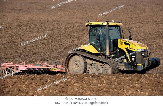 Cultivating seedbed using a Caterpillar Challenger tracked tractor. (Photo by: Wayne Hutchinson/Farm Images/UIG)