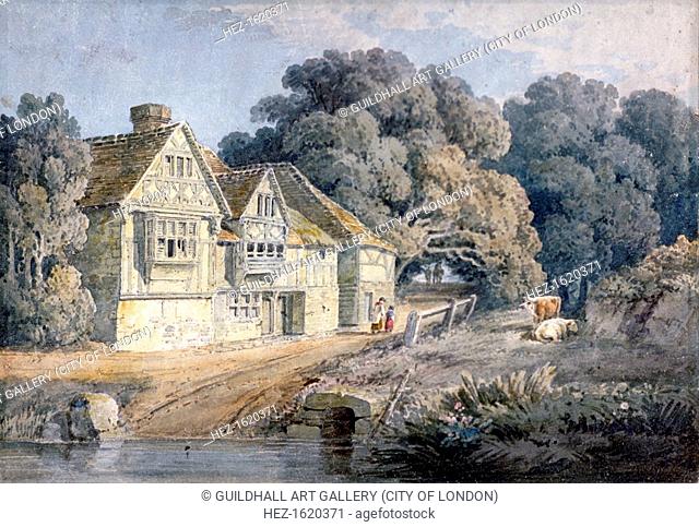 'The Ost House at Hastings, Sussex', 19th century. The Ost House sits on the bank of a river with figures walking past and cows nearby