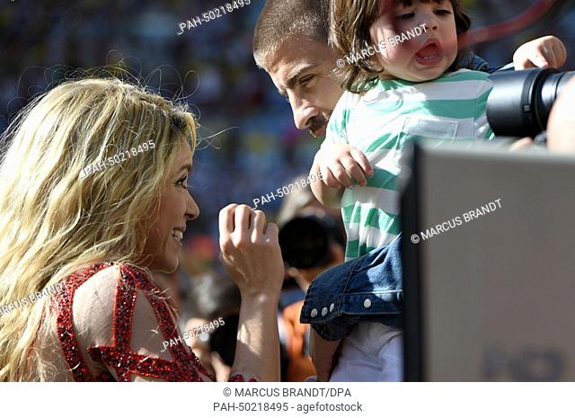 Colombian singer Shakira speks to his husband Spanish soccer player Gerard Pique and son Milan after the Closing Ceremony prior to the FIFA World Cup 2014 final...