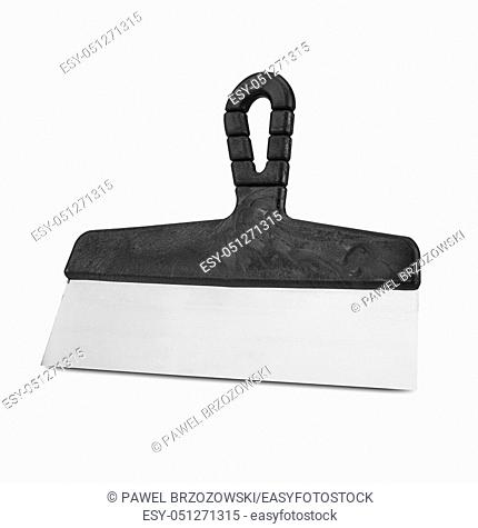 Finishing spatula on white background. Handle coating knife on white background. Stainless steel spatula with plastic handle