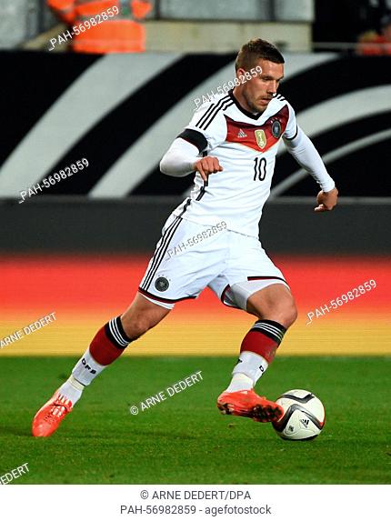 Germany's Lukas Podolski in action during the international friendly Germany vs Australia in Kaiserslautern, Germany, 25 March 2015