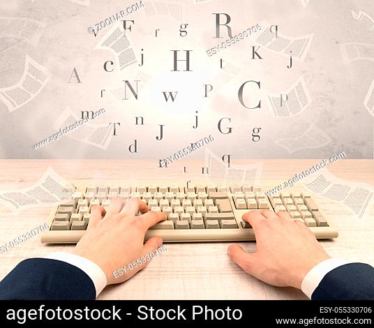 First person view of an elegant businessman hand typing with fluttering papers around