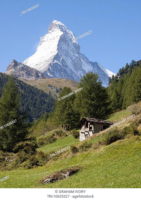 The Matterhorn with old stone barn in foreground, Valais, Switzerland