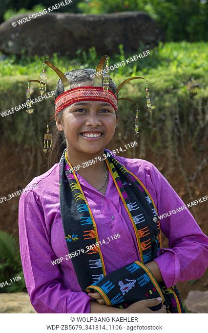 Portrait of a young Manggarai woman in a Melo Village in the hills near Labuan Bajo, a fishing town located at the western end of the large island of Flores in...