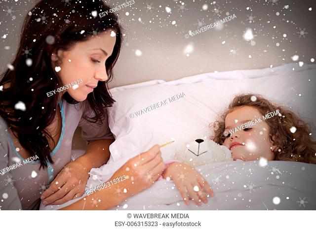Composite image of mother taking her daughters temperature
