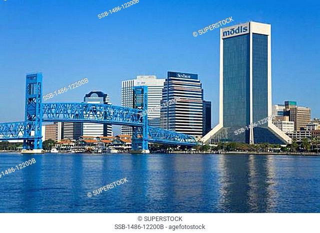 Bridge across a river with skyscrapers at the waterfront, Modis Tower, John T. Alsop Jr. Bridge, St. John's River, Jacksonville, Duval County, Florida, USA