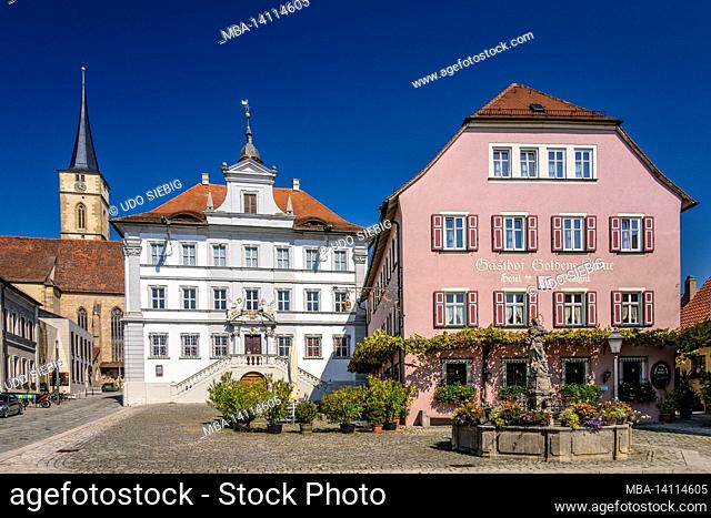 germany, bavaria, lower franconia, franconian wine country, iphofen, market square with parish church sankt veit, town hall and marienbrunnen