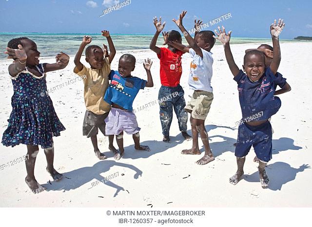 Children playing on the beach, Zanzibar, Tanzania, Africa
