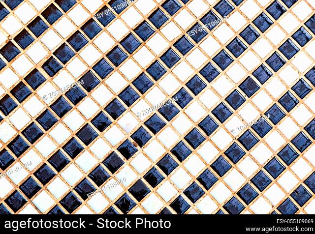 Black and white ceramic colorful tiles mosaic composition pattern background. Abstract colorful mosaic texture