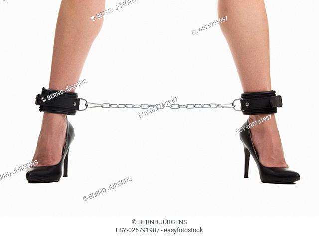 woman legs with a chain