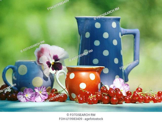 Still-life of blue and red spotted jugs