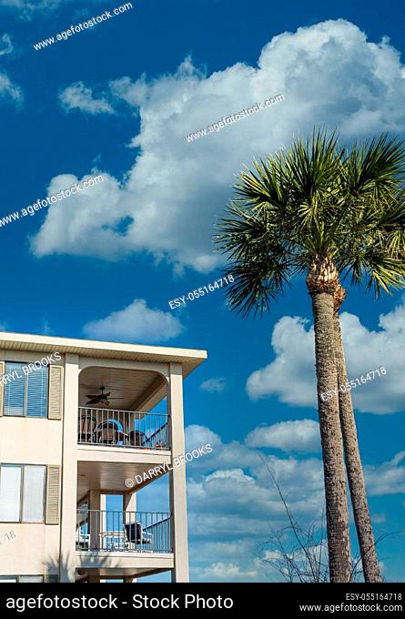 A tropical beach condo under a clear blue sky