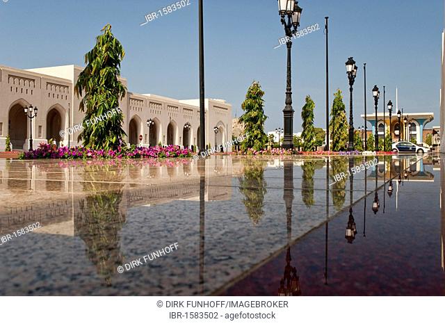 Main building of the Al Alam Palace, with reflection on the shiny polished tiles of the entranceway, Muscat, Oman, Middle East