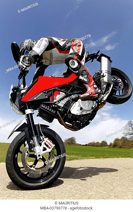 Motorcycle, Husqvarna Nuda 900 R, year of construction in 2012, Stoppie on country road
