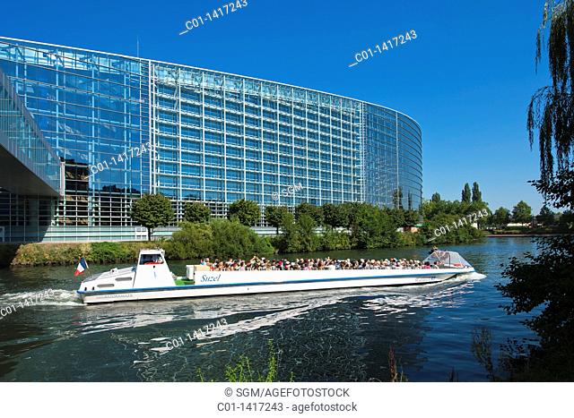 Batorama tour boat on Ill river and Louise Weiss building, European Parliament, Strasbourg, Alsace, France