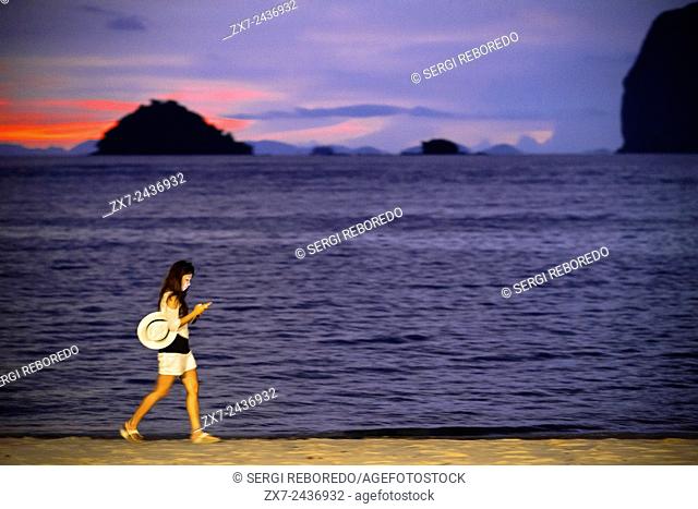 Woman on the Changlang Beach. Anantara Si Kao Resort & Spa, south of Krabi, Thailand. Located on the soft white sands of Changlang Beach