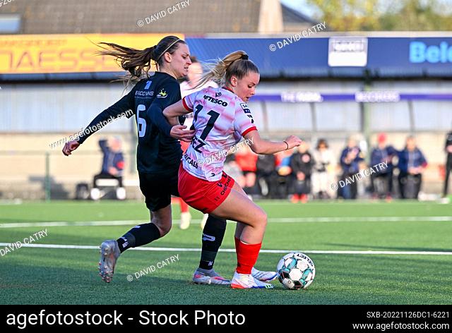 Lisa Despret (6) of Woluwe pictured defending on Imani Prez (11) of Zulte-Waregem during a female soccer game between SV Zulte - Waregem and WS Woluwe on the...