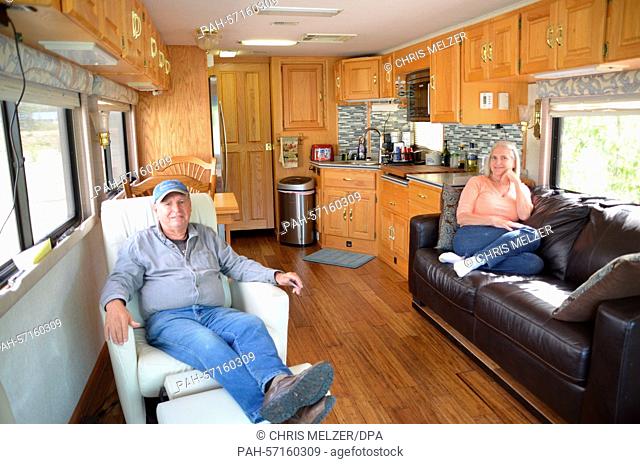 Julie und Andy Renduelis sit in the living room of their camping van in Fairbanks, Alaska, USA, 11 June 2014. Modern camping vans include nearly every amenity...