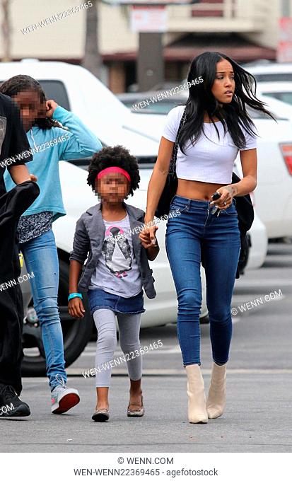 Chris Brown's ex-girlfriend, Karrueche Tran, spotted out shopping with her younger siblings Featuring: Karrueche Tran Where: Los Angeles, California