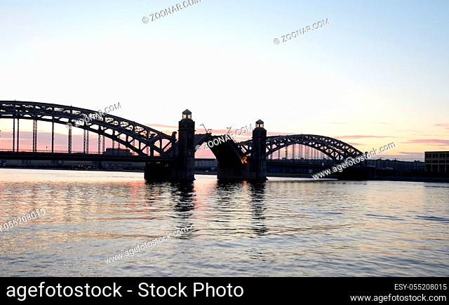 Neva river and Bridge Peter the Great before sunrise in St.Petersburg, Russia