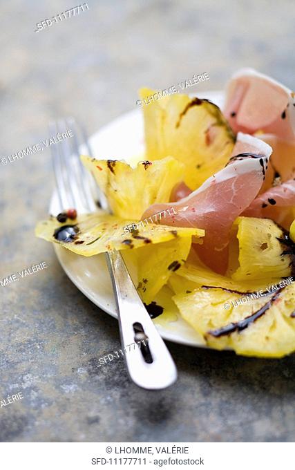 Pineapple carpaccio with dry-cured ham