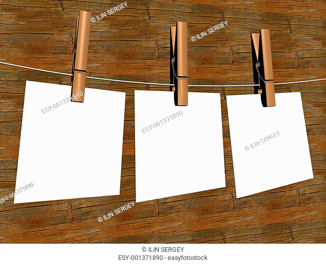 Three sheets of the paper, hanging on a cord. 3D image