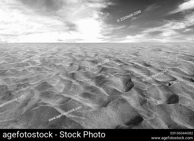 Sand in the Dunes of Maspalomas, a small desert on Gran Canaria, Spain. Black and white photo